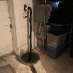 Sump pump and pit